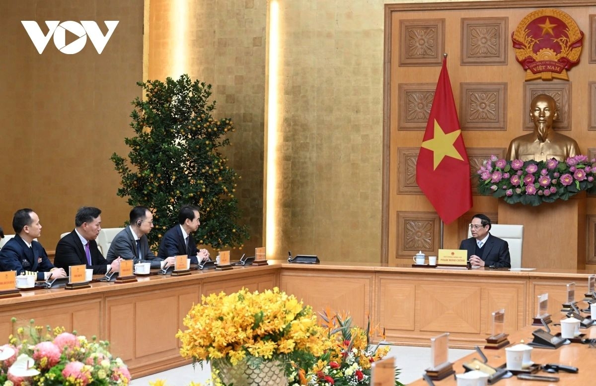 Prime Minister Pham Minh Chinh receives Chinese Ambassador He Wei in Hanoi on February 8