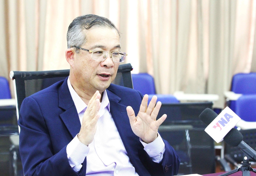 Assoc. Prof. Dr. Neak Chandarith, Director of the Institute for International Studies and Public Policy (IISPP) at the Royal University of Phnom Penh grants an interview to the Vietnam News Agency. (Photo: VNA)