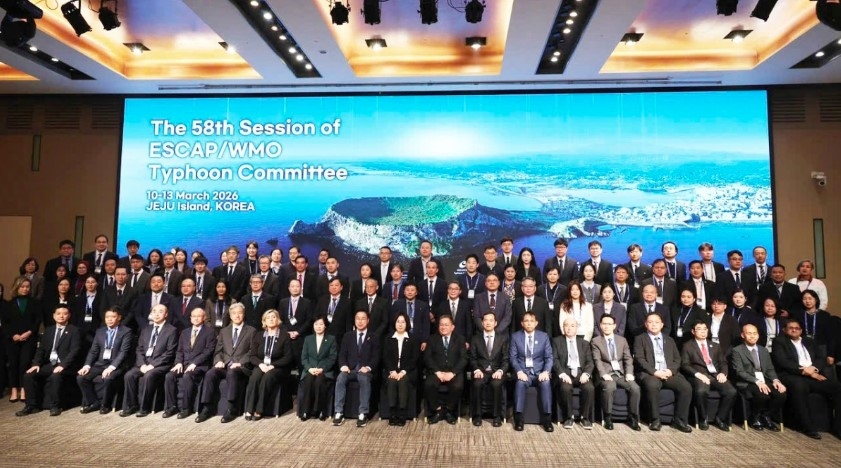Delegates pose for a group photo at the event