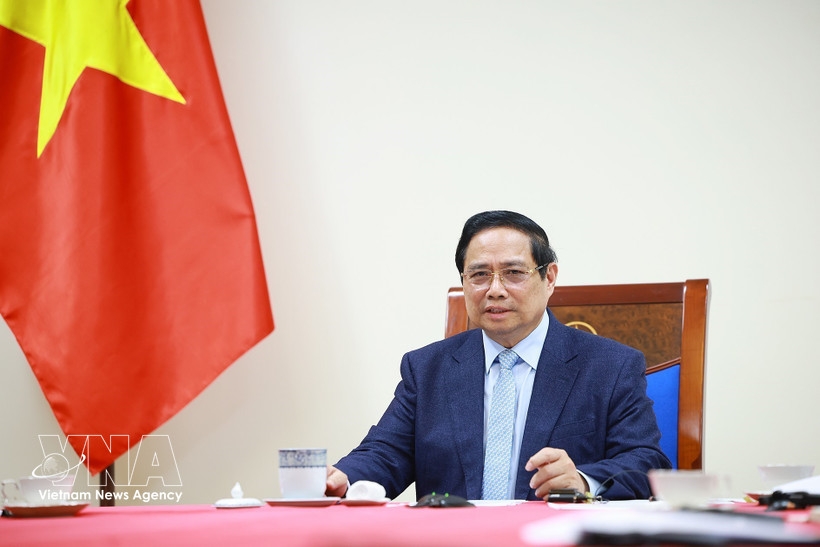 Prime Minister Pham Minh Chinh in the phone talks with Kuwaiti Prime Minister Sheikh Ahmed Abdullah Al-Ahmad Al-Sabah on March 9 (Photo: VNA)