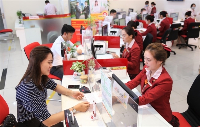 For deposits with 12-month term or more, the rates at many banks have approached or exceeded 7% per year. — Photo cafef.vn