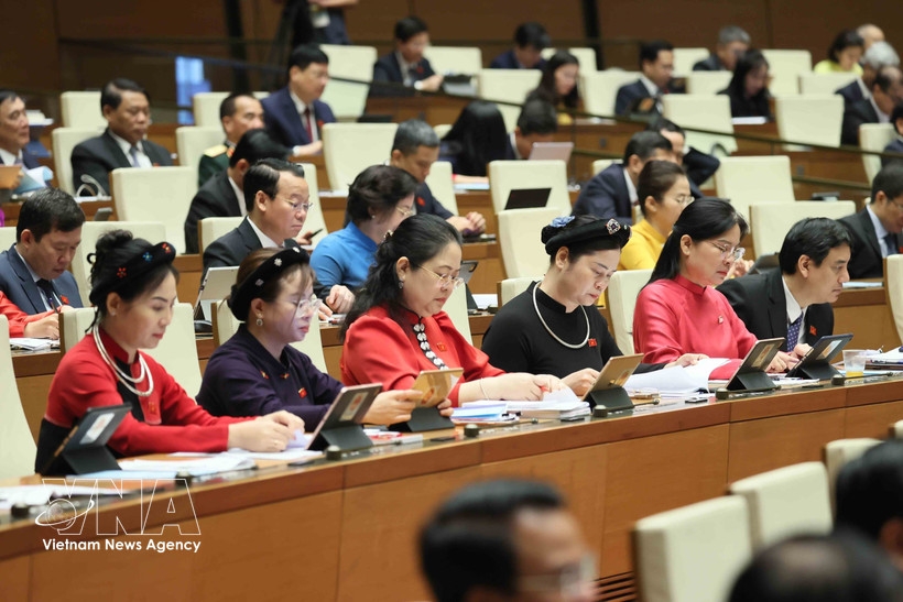 Female deputies of the National Assembly attend the opening session of the ninth sitting of the 15th National Assembly on May 5, 2025.