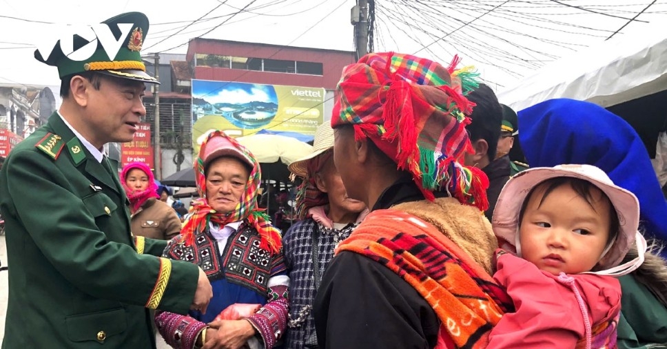 A highland child, carried on her mother’s back to the polling station, gazes curiously at the stream of voters- a simple yet moving moment capturing the next generation witnessing the nation’s democratic day.