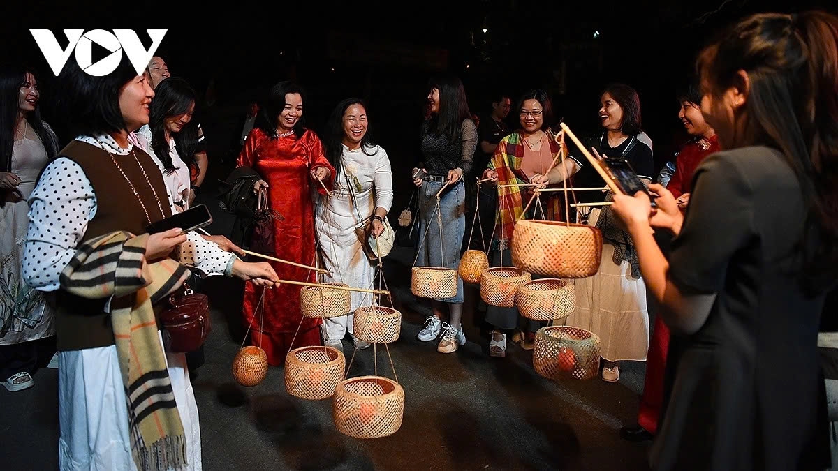 Visitors on the night tour are given lanterns before making a pilgrimage to Thuong Temple, where the Hung Kings are worshipped on Nghia Linh Mountain.