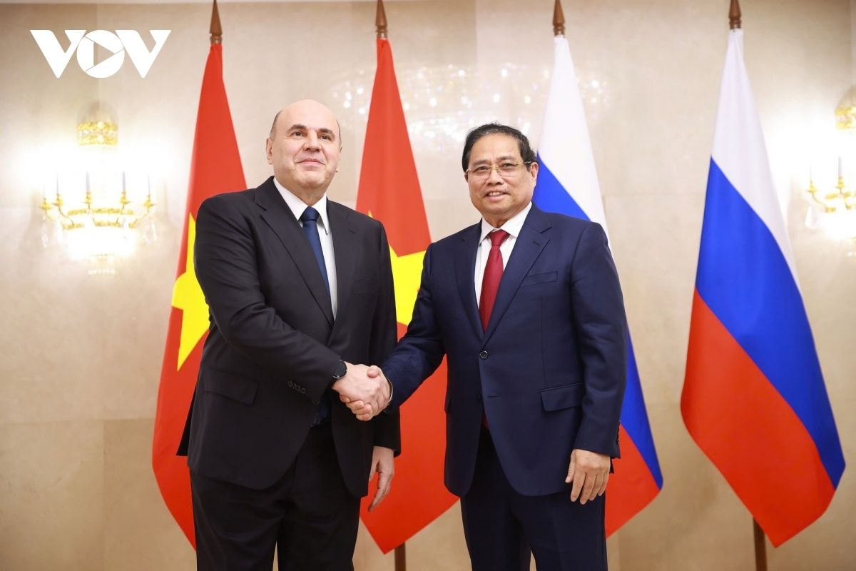 Russian Prime Minister Mikhail Mishustin and visiting Vietnamese Prime Minister Pham Minh Chinh (R) pose for a photo ahead of their talks in Moscow on March 23