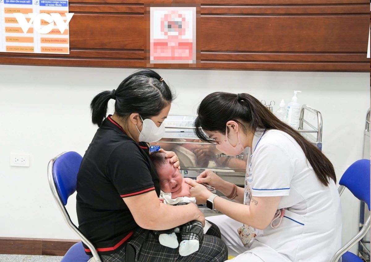 A child receives vaccination at Hanoi Children’s Hospital