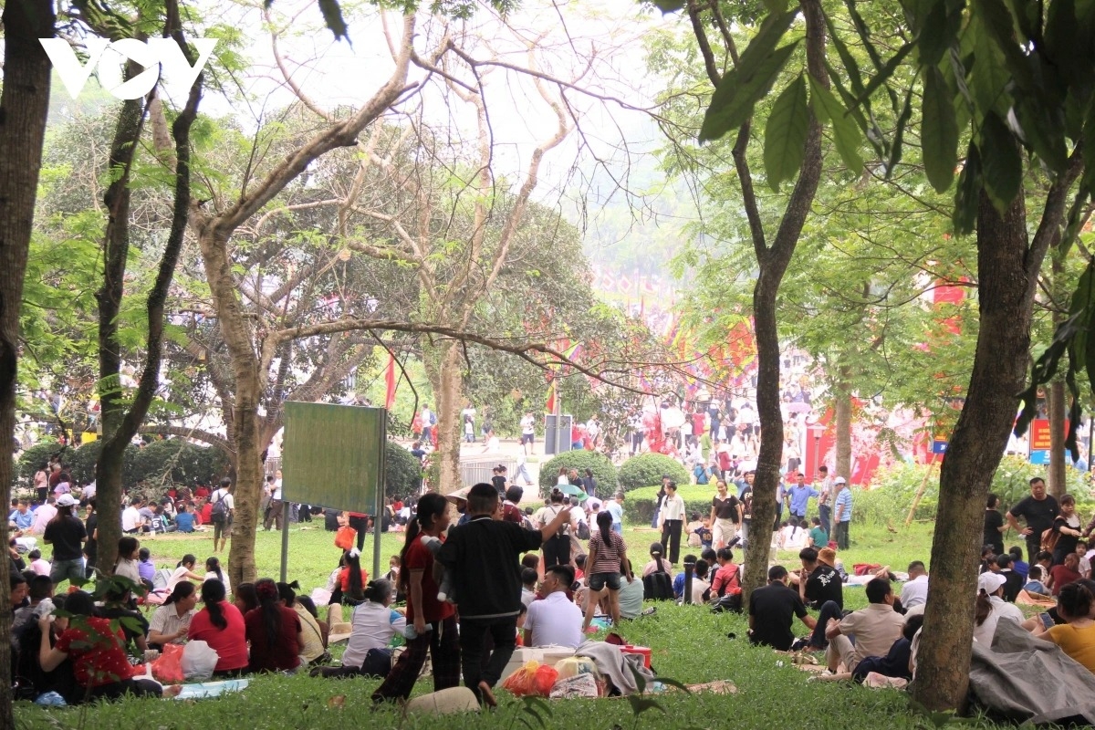 People took a short rest on the grass before continuing to take part in the day’s activities.