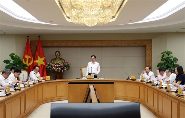 Deputy Prime Minister Ho Quoc Dung chairs a meeting in Hanoi on April 20. — Photo: baochinhphu.vn