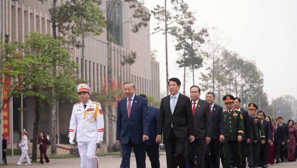 General Secretary To Lam and Party and State leaders lead National Assembly deputies from the National Assembly building to President Ho Chi Minh’s mausoleum.