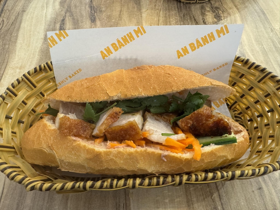 A crispy pork belly Bánh mì, its golden crackling glistening, makes for an irresistibly tempting sight. (Photo: Danielle Wedlock)