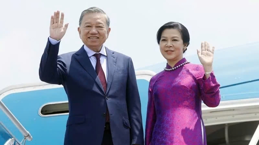 Party General Secretary and State President To Lam and his spouse