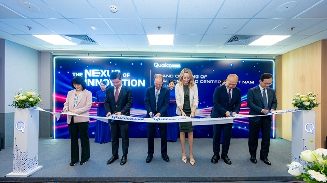 Delegates attend the ribbon-cutting ceremony at Qualcomm’s new R&amp;D centre in Hanoi on May 12. — Photo provided by the agency