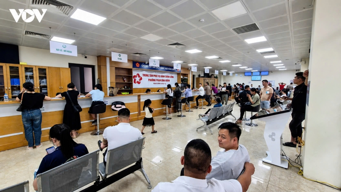 Residents wait to complete administrative procedures at a Public Administrative Service Centre in Hanoi