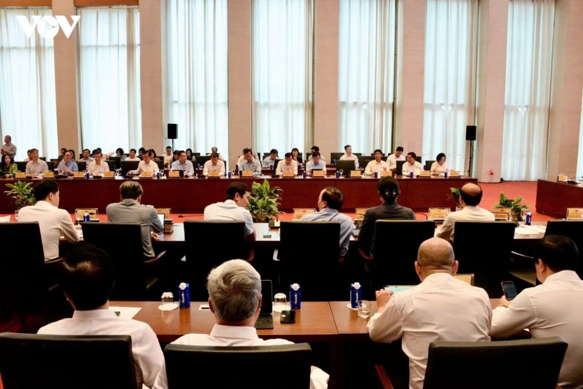 Lawmakers attend the conference in Hanoi on June 16