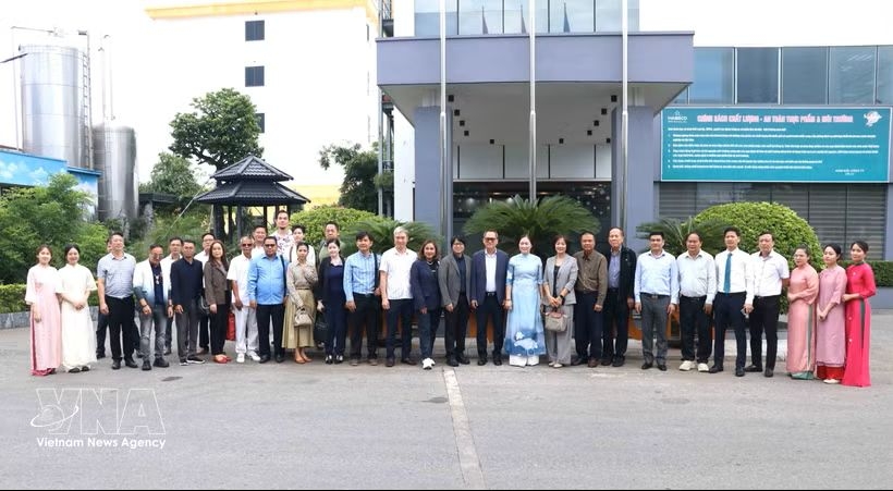 Lao, Cambodian and Thai journalists visit Hai Phong on June 18