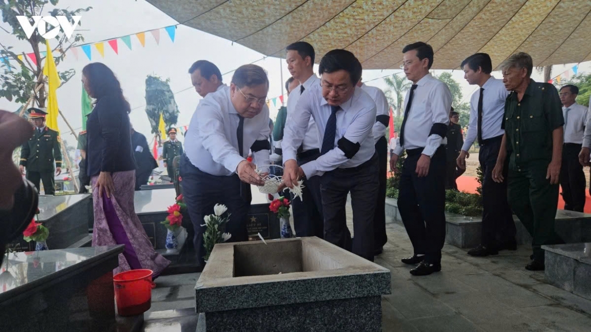 Delegates attend the memorial and burial ceremony, held at Vinh Hung Martyrs' Cemetery in Tay Ninh province on July 6.