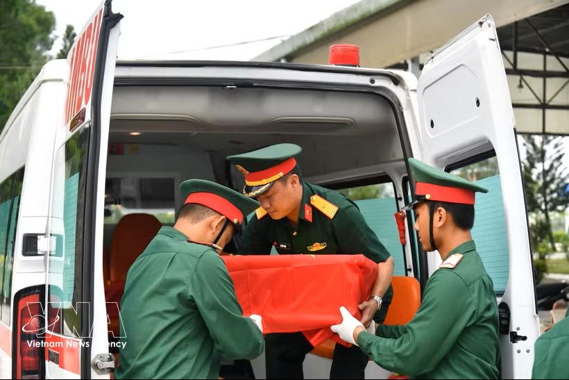 Samples are trucked for airlift to Hanoi for DNA testing at the Can Tho Martyrs’ Cemetery on July 2, 2026
