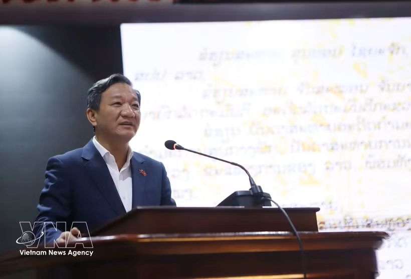 Vietnamese Ambassador to Laos Nguyen Minh Tam speaks at the event