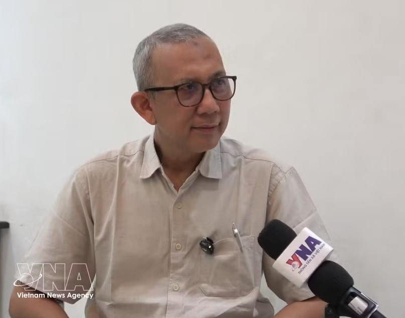 Beni Sukadis, Senior Coordinator at the Indonesian Institute for Defence and Strategic Studies, grants an interview to the Vietnam News Agency. (Photo: VNA)