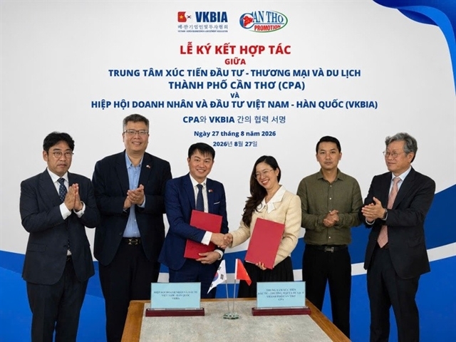 Leaders of the two agencies at the MoU signing ceremony (Photo: baochinhphu.vn)