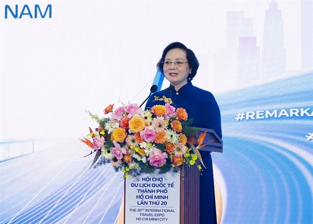 Deputy Prime Minister Pham Thi Thanh Tra delivers a speech at the high-level tourism forum held in HCM City on August 27. (Photo courtesy of the organiser)