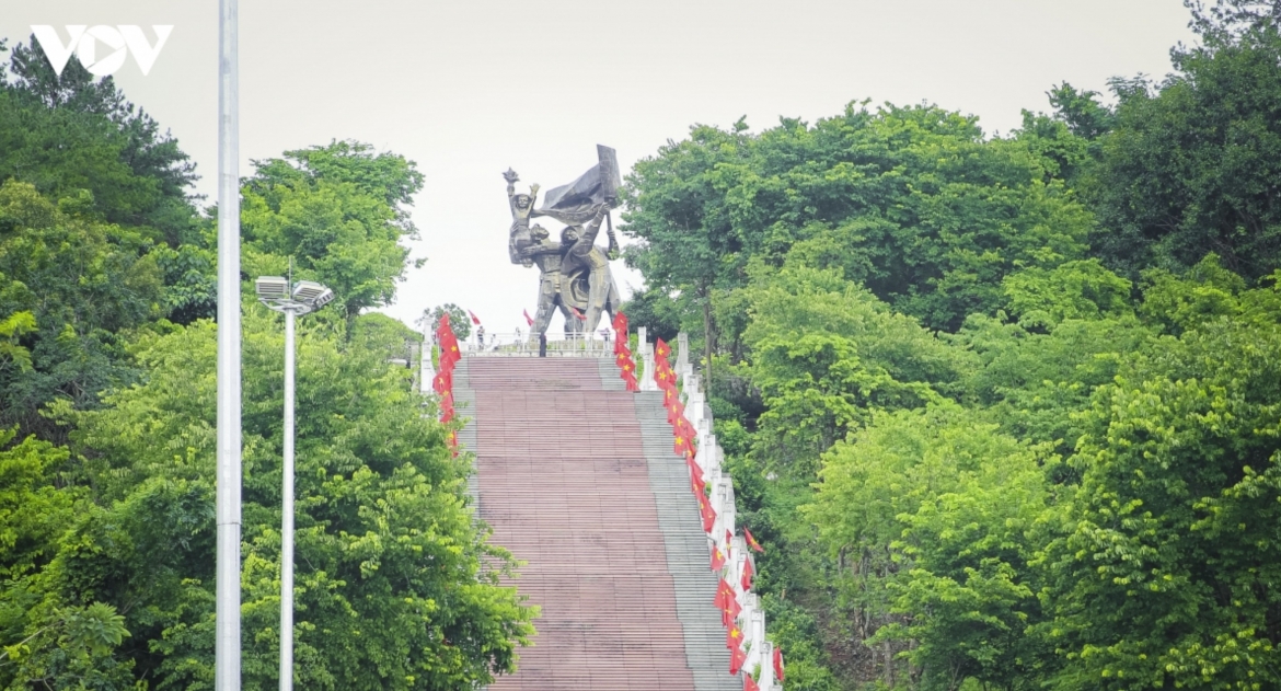 The Dien Bien Phu Victory Monument is brightly decorated with national flags and flowers ahead of National Day.