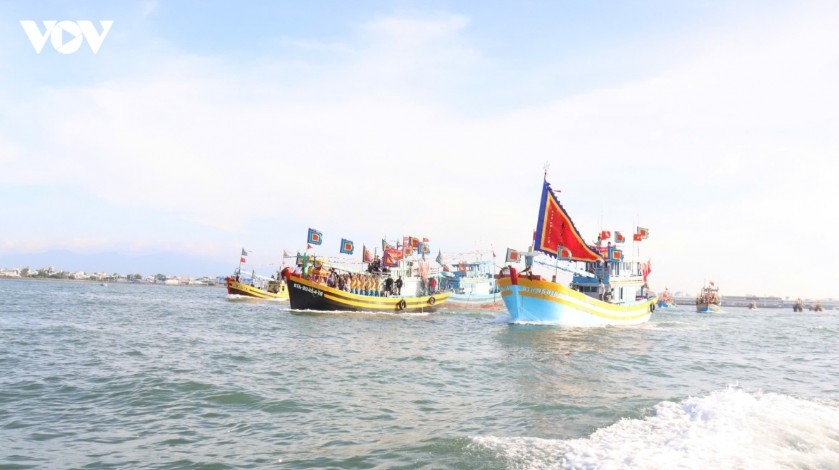 Fishing boats head to Hon Lao island for traditional rituals of the Phan Thiet Whale Festival.