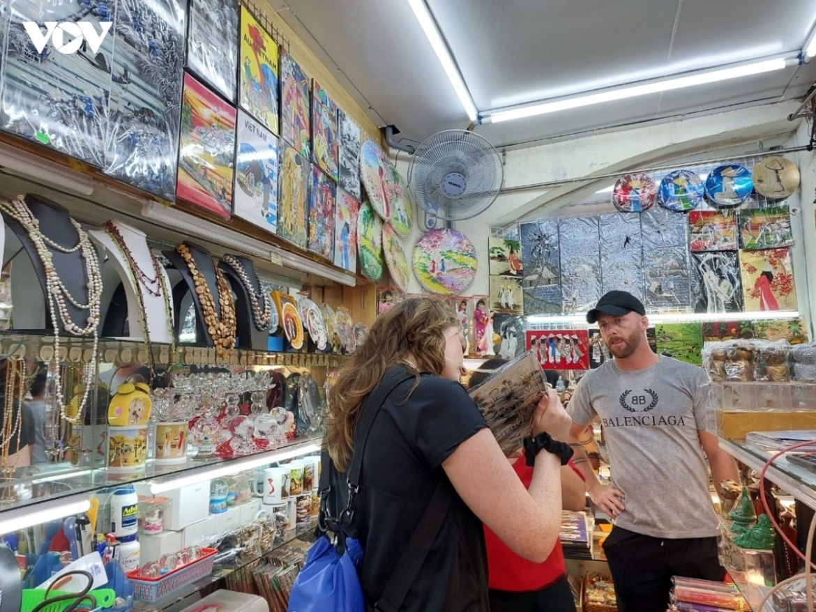 International tourists shop for souvenirs at Ben Thanh Market in Ho Chi Minh City