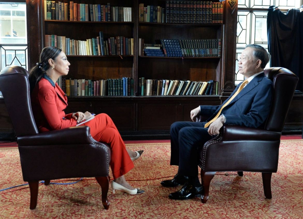 General Secretary of the Communist Party of Vietnam Central Committee and President To Lam (R) in an interview with Bloomberg TV